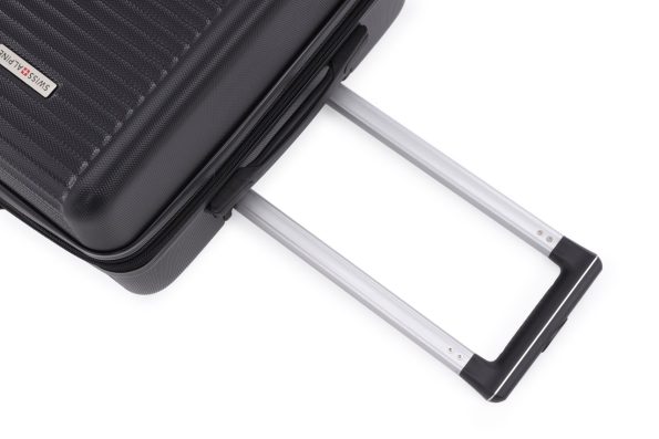 Close-up of a black suitcase with a textured surface, featuring an extended silver telescopic handle and a visible brand tag reading 'SWISS ALPHA.'